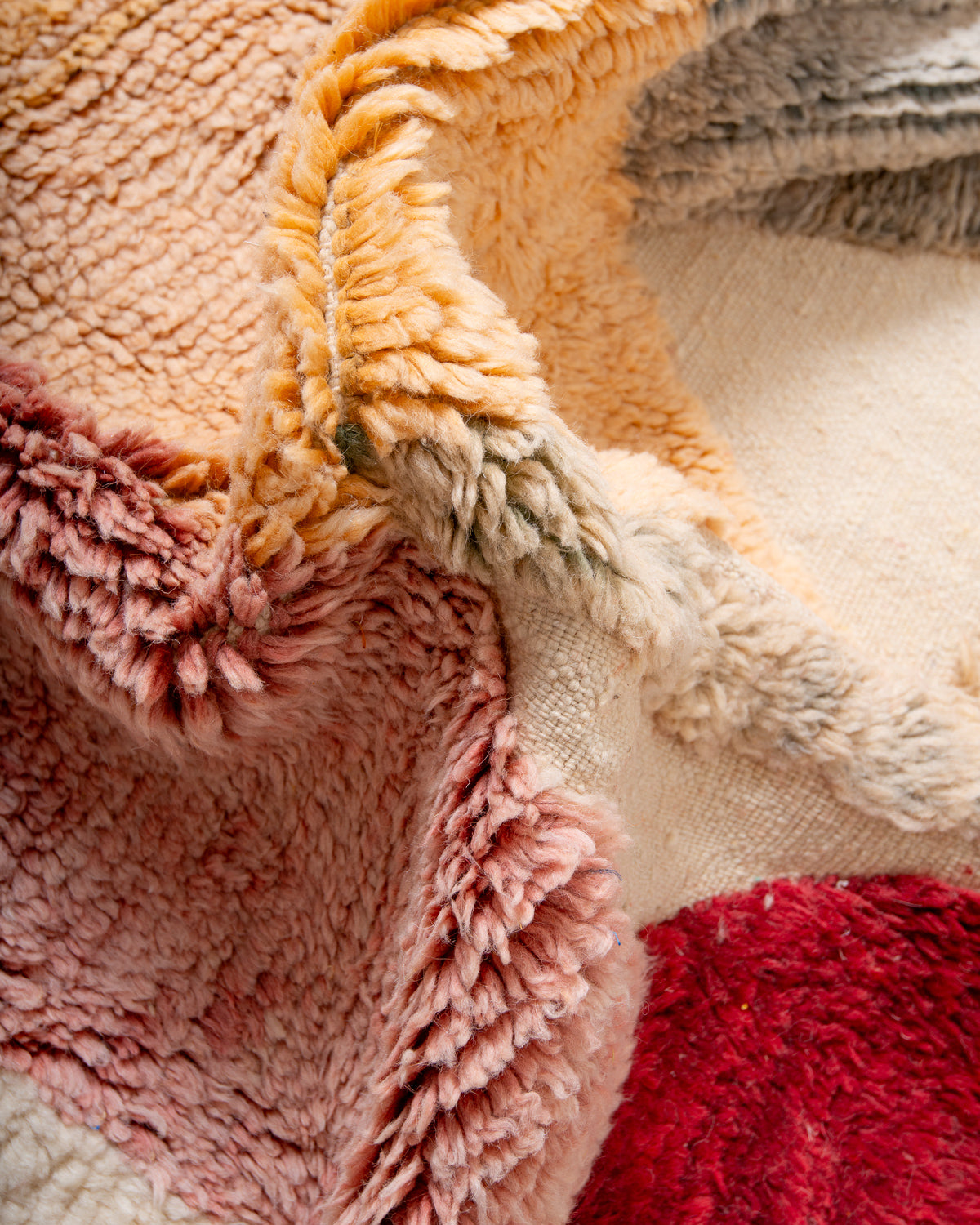 Modern, designer, handcrafted Berber rug from Morocco. Beniourain carpet with beautiful colours and patterns and fluffy wool texture.